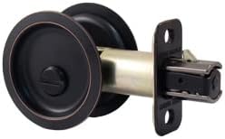 Round Pocket Door Lock, Privacy (Bed/Bath) Latch, 2-3/8" Backset, RCL, Vintage Bronze by Stone Harbor Hardware