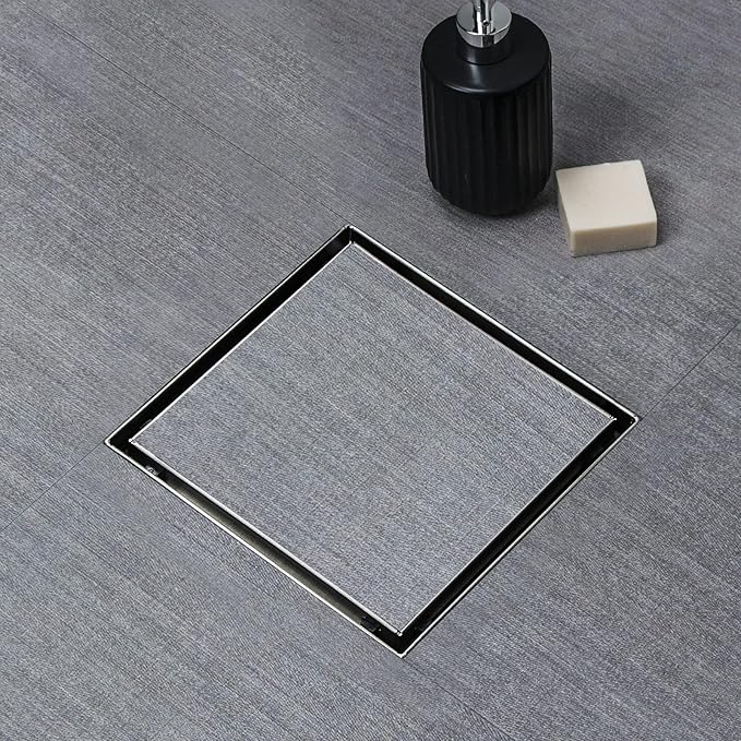 SaniteModar Square Shower Drain 4 inch Comes with Tiled Stealth and 304 Stainless Steel Brushed 2 in 1 Panels. The Shower Drain is Equipped Hair Filters and Threaded Joint with Rubber Seal